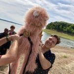 man holding life sized puppet