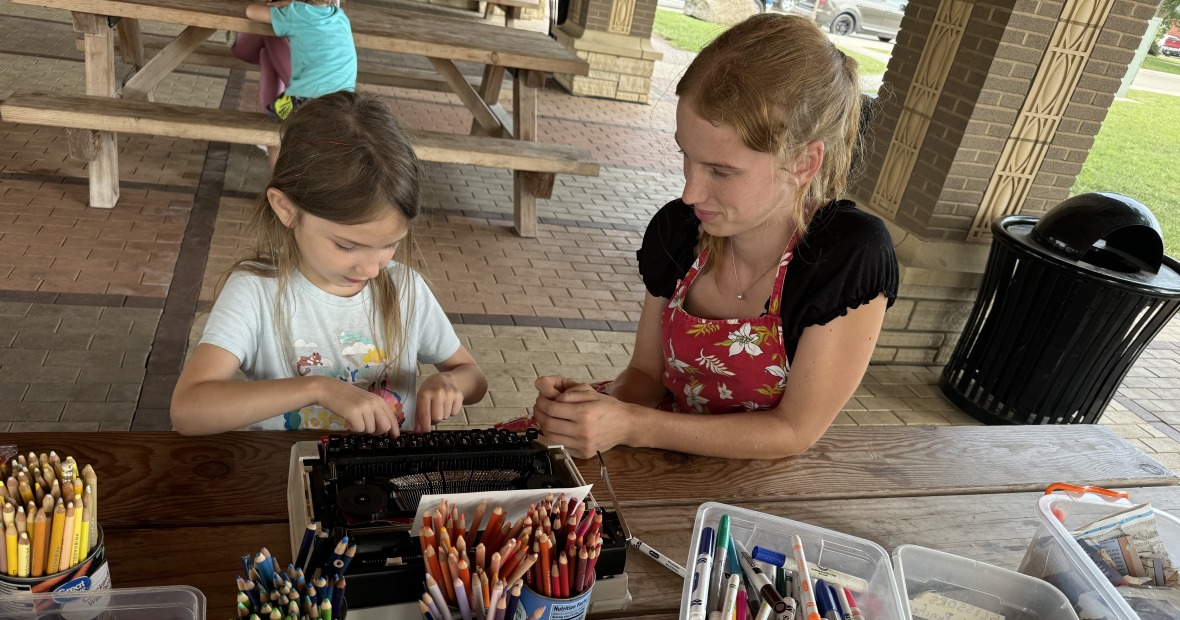 two people working on a art project