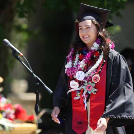 Student in regalia at graduation.