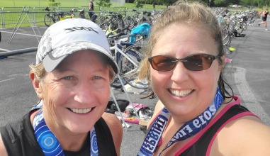 Rachel Bly, right, with friend Cat Campbell Currier after one of the 26 sprint triathlons they completed toward their goal of finishing one in every state.