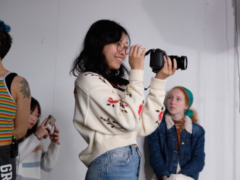 Nana Okamoto ’20 looks through the camera during Fundamentals of Video Production class