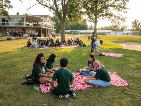 students having a picnic at the golf course 