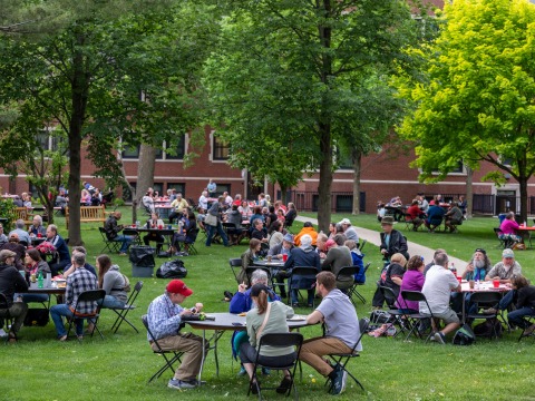 reunion guests outside eating 