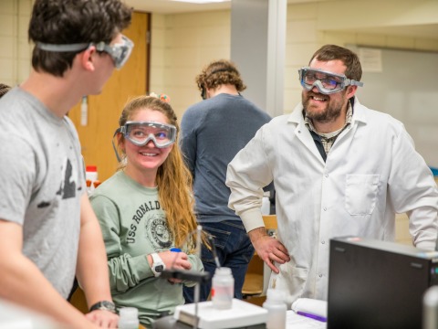 Andrew Graham with students in the lab