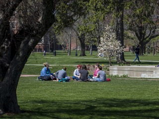 Students enjoy the weather outdoors