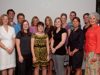 Group shot with women and men in two rows