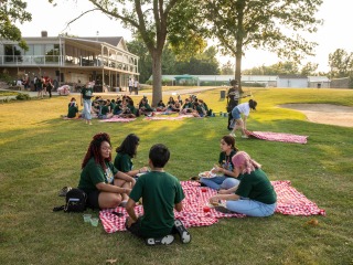 students having a picnic at the golf course 