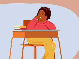 A young Black student sits nervously at her desk.