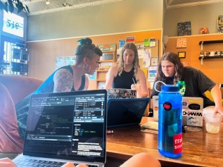 Jennifer Snook, lecturer in Sociology, with students Grace Marsh '24 and Theo Hadley '24.