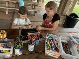 two people working on a art project